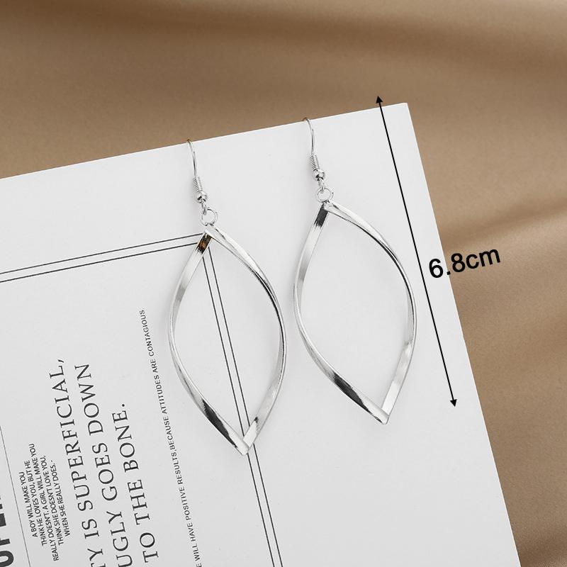 New Spiral Women's Hook Earrings Hollow Twist Geometric Statement Long Hanging Earrings Wraped Oval Metal Pendants Earrings