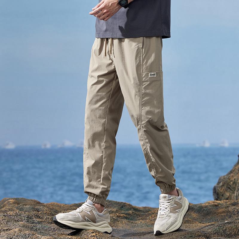 

Men s Summer Ice Silk Jogger Pants – Lightweight, Loose-Fit, Trendy, Versatile Casual Workwear. XL чорний