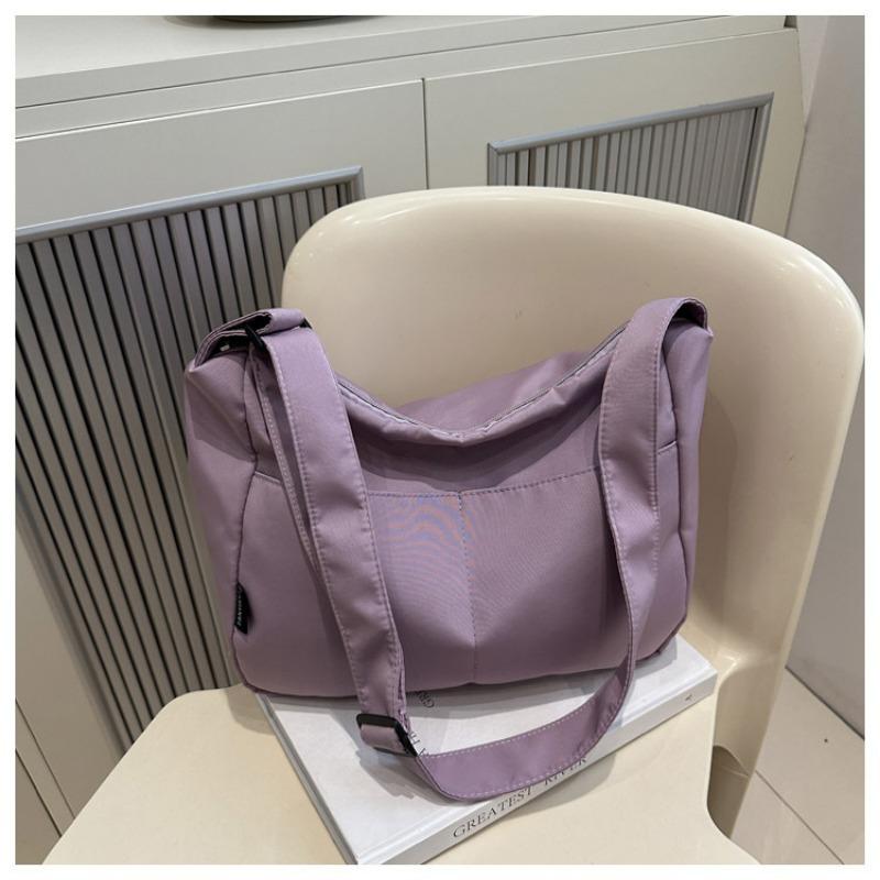 New casual messenger canvas bag, simple large-capacity shoulder bag, niche design sense, daily commuter bag