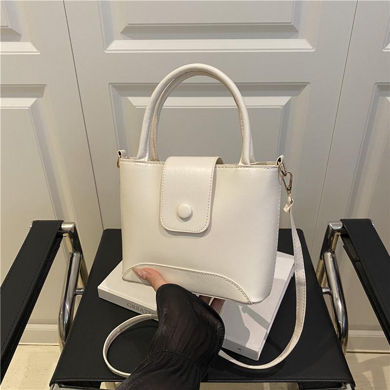 Premium simple niche fashion handbag women's summer new bucket bag single shoulder oblique span women's bag