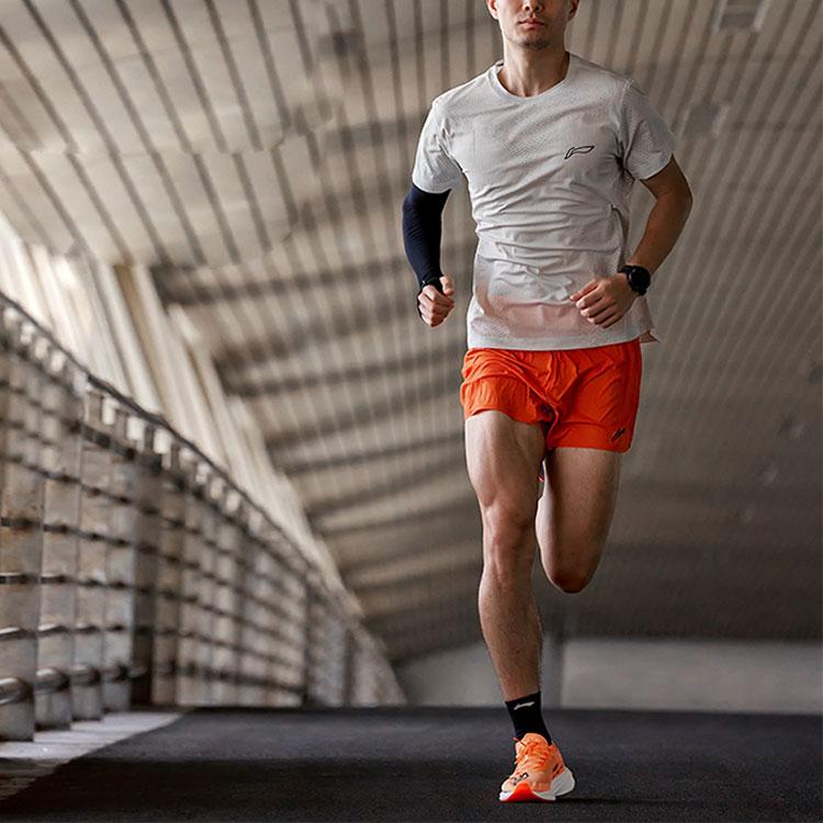 Li Ning Running Series Solid Color Logo Mid Waist Straight Leg Sports Shorts Men Shorts Orange AKSU003-3