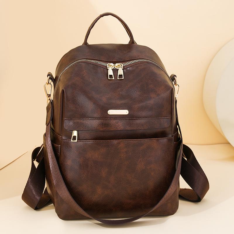 Retro soft leather backpack women's new fashion trend backpack student simple shoulder travel bag