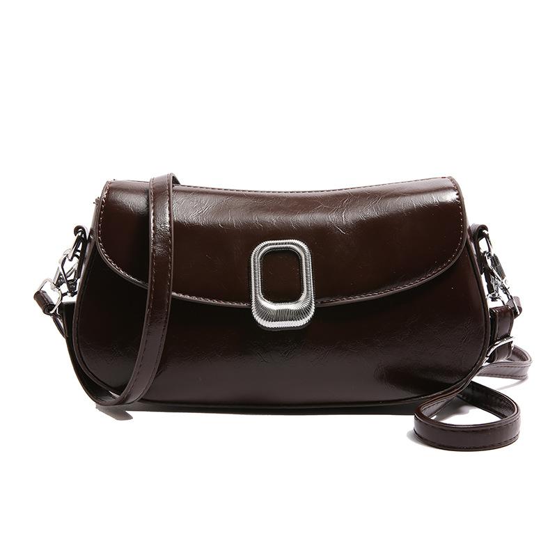 

В этом году популярны модные и фактурные сумки под мышками, простые и ретро-сумки через плечо, нишевые и универсальные темпераментные сумки-мессенджеры. кофейный