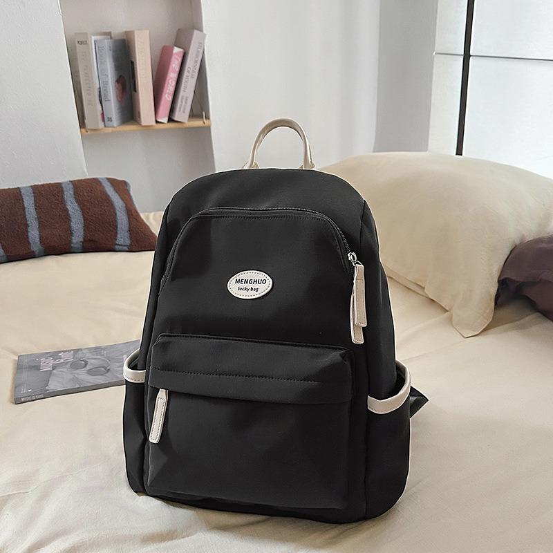 Fresh and sweet candy color backpack for junior high school students, solid color, simple and large-capacity backpack.