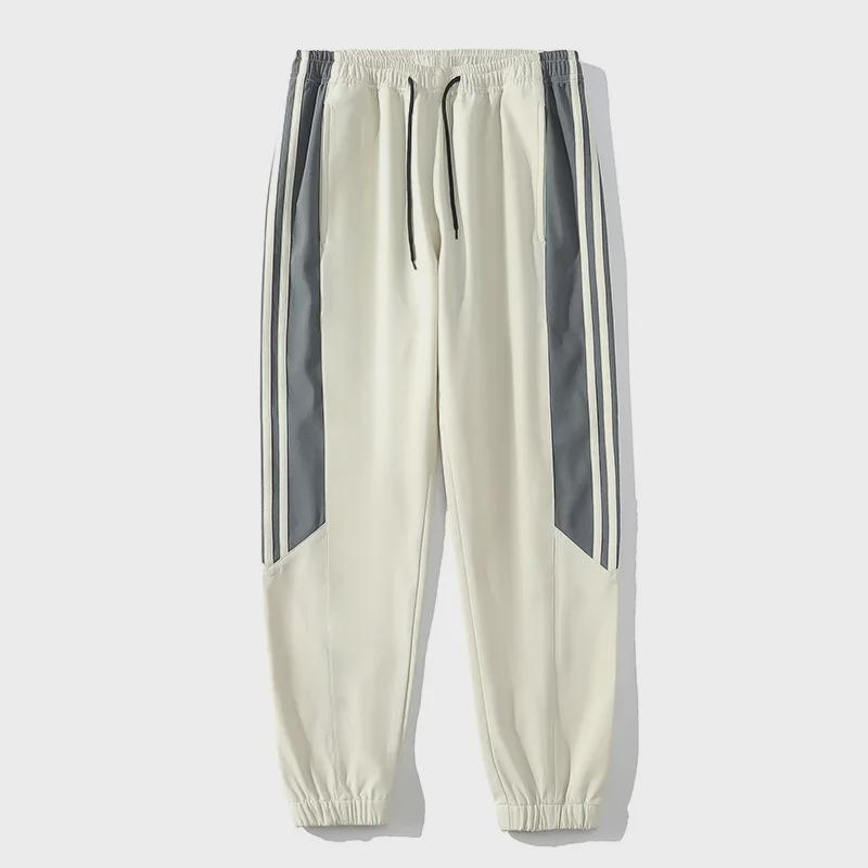 Men's Casual Two-Piece Sports Suit - New Spring/Autumn Styles, Youthful Fashion Trend, Stand-Up Collar, Loose Fit.