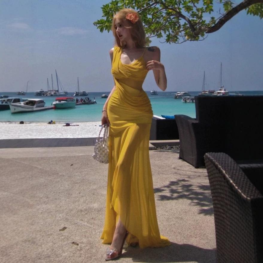 Vacation style Spice Girl yellow suspender dress women's summer pleated slim fishtail dress design sense mesh skirt