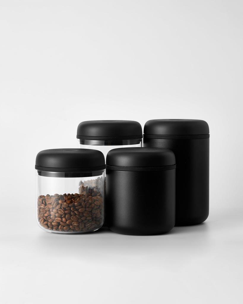 Fellow Electric Atmos Vacuum Canister, an electric canister for coffee and food storage, featuring an automatic vacuum function and stylish interior
