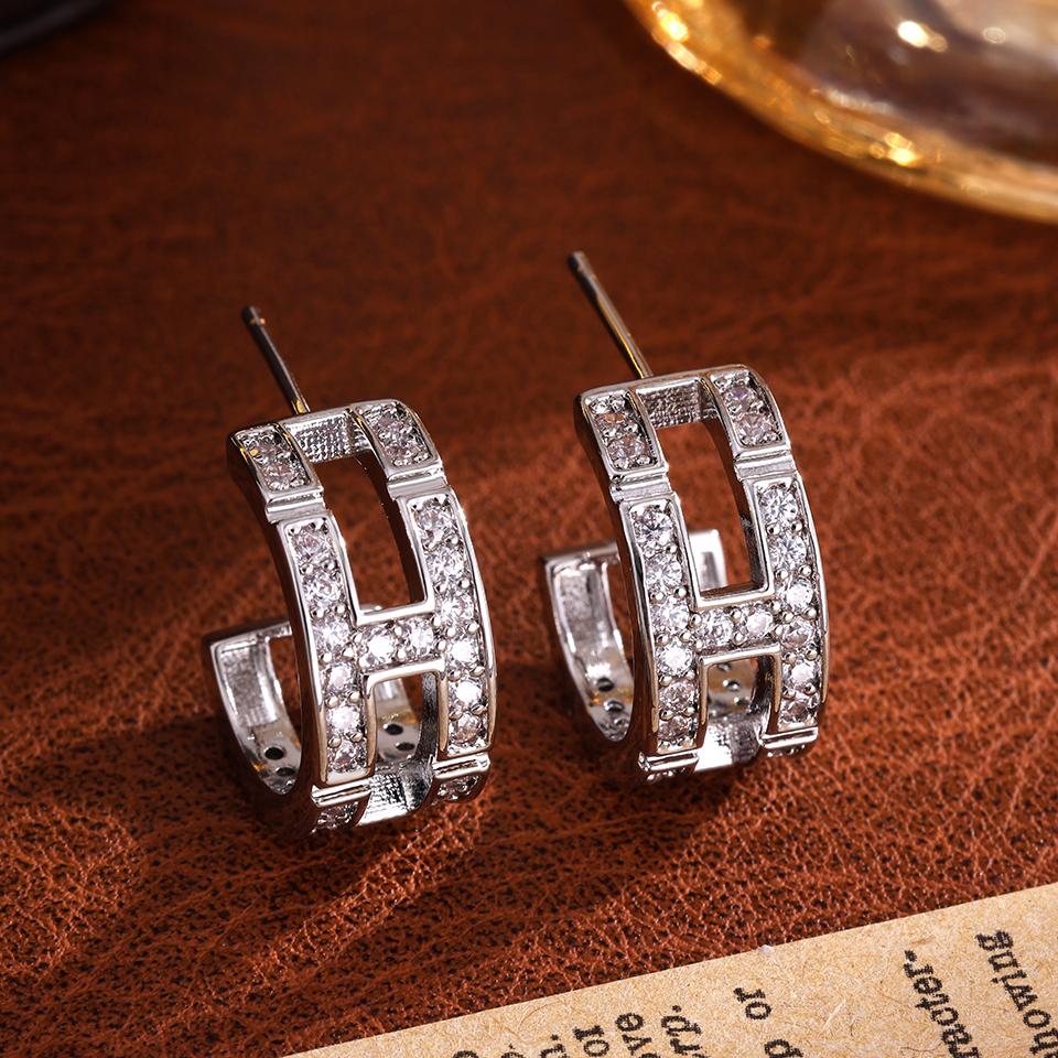 ZAKOL New Niche Design Hollow Geometric CC Shaped Earrings Shiny Zircon Crystal Luxury Brand Earring Party Accessories
