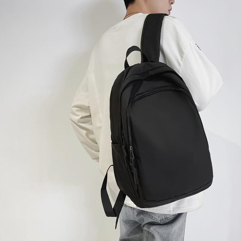 Spring new college style solid color student schoolbag Korean version large-capacity junior high school backpack