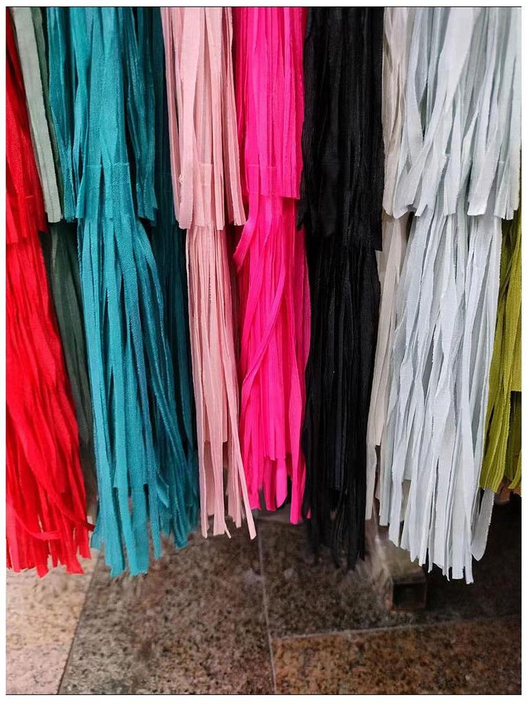 2025 Frühling/Sommer Koreanischer Nischenrock mit einfarbiger Quaste, hohe Taille, mittellang