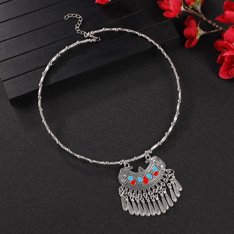 Vintage tassel collar hollow flower seedling silver pendant necklace niche personality collarbone chain women