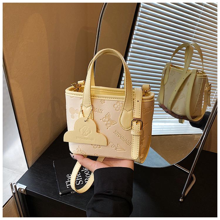 

Vegetable basket bag women s summer new niche design texture commuter bucket bag жёлтый