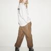 Uniqlo X Kaws Collaboration SS23 Solid Color Floating Doll Print Crew Neck Pullover Long Sleeve Knit Sweater Unisex sweater White 467395-01
