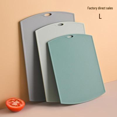 Planche à découper de cuisine double face: Planche en plastique durable et suspendable pour la viande, les fruits et les aliments cuits.
