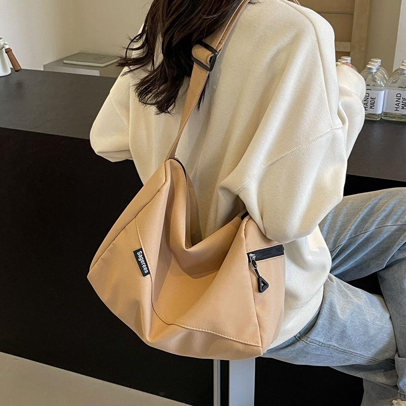 Sports casual lightweight outing bag women's class work clothingpure color shoulder bag large capacity casual travel crossbody bag