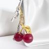 Keychain Bag Charm with Golden Shimmering Resin Cherries Hypoallergenic Steel Key Pendant Bag Wallet Accessory