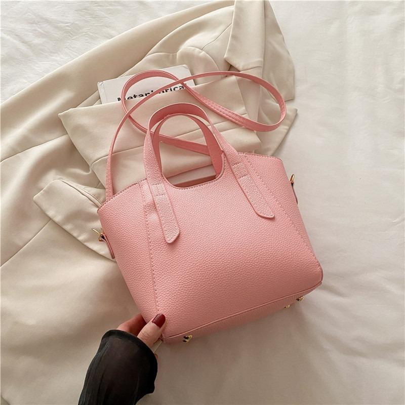 

Summer new niche silver high-end vegetable basket handbag lychee pattern texture shoulder messenger bag women рожевий