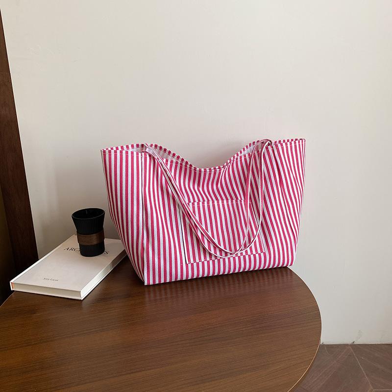 

Красивая маленькая свежая портативная сумка-тоут женская весенняя новая полосатая универсальная сумка через плечо сумка подмышку розовый