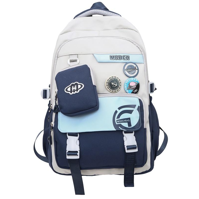 Stylish and Exquisite Contrasting Color Badge Large-capacity Backpack 24 New Primary School Junior High School Boys and Girls Schoolbag
