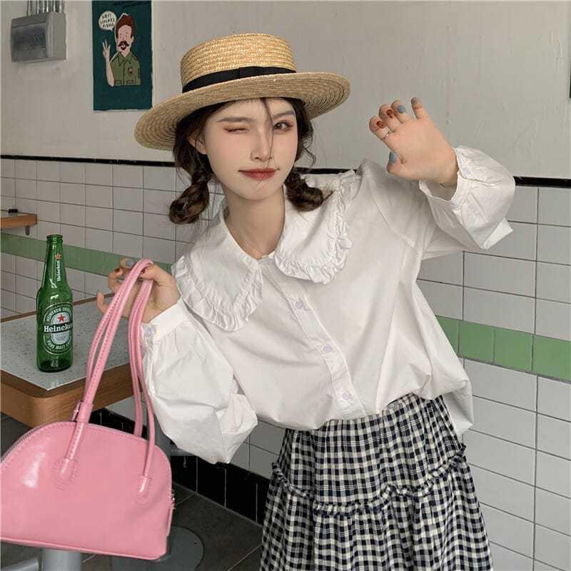 French doll collar long-sleeved top women's spring and autumn design sense gentle wind inner shirt age-reducing white shirt
