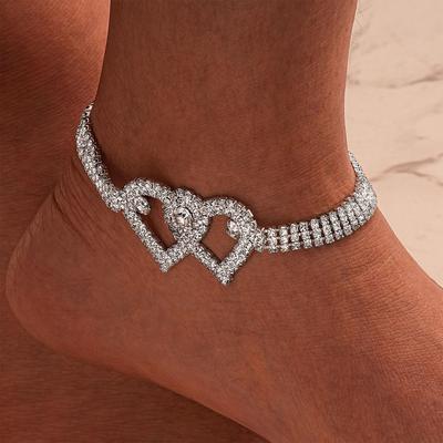 Trendy enkelbandje met dubbel hartje en diamanten - een populair accessoire voor dames