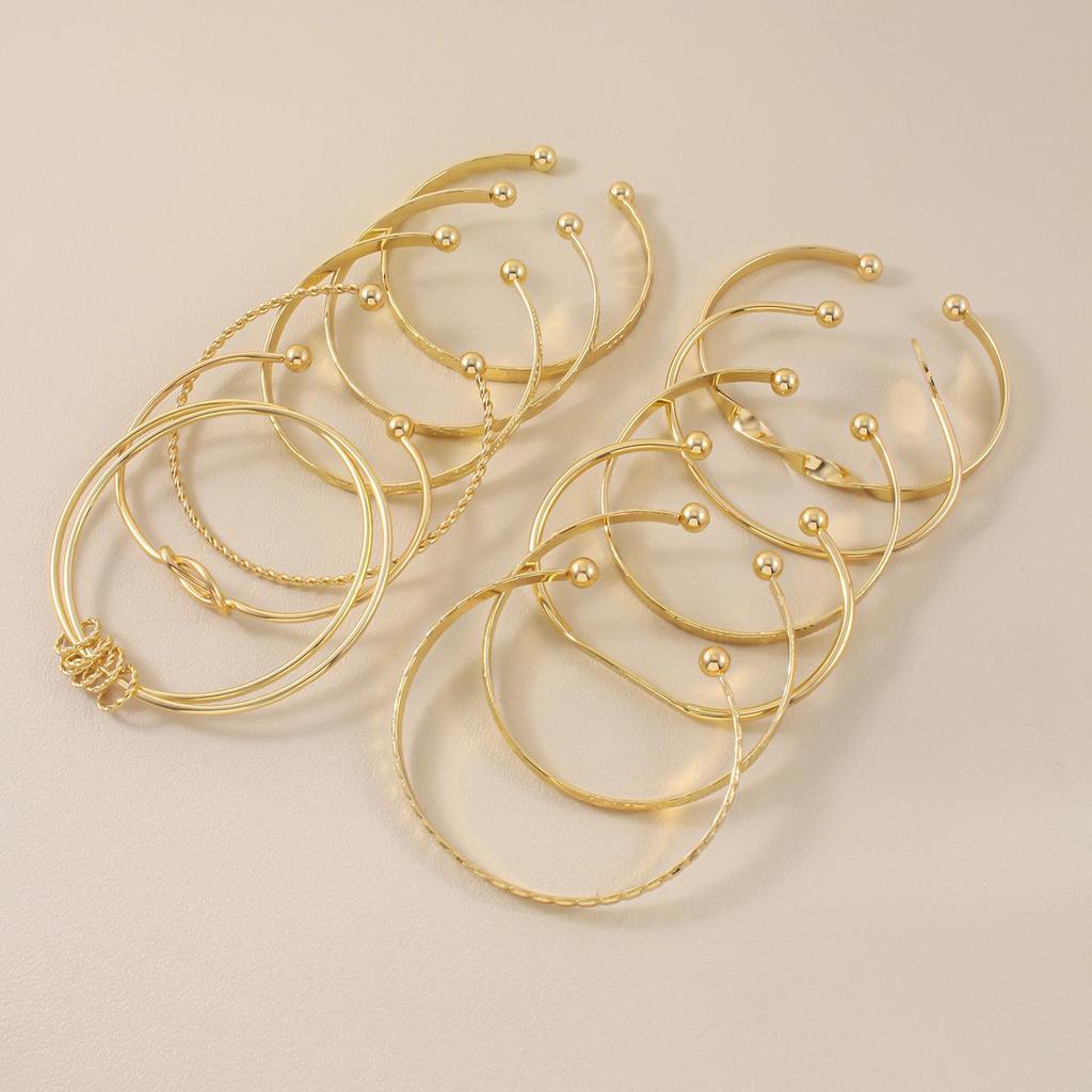 Women's Geometric Pattern Metal Bracelet Set - 12 Pieces, Ancient Craftsmanship, Summer Collection.