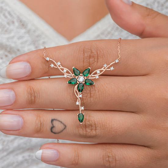 

Серебряное колье с бутоном розы и зеленым цветком зелёный