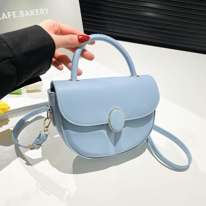 Women's bag new trendy high-end fashion niche design solid color retro messenger bag portable saddle bag