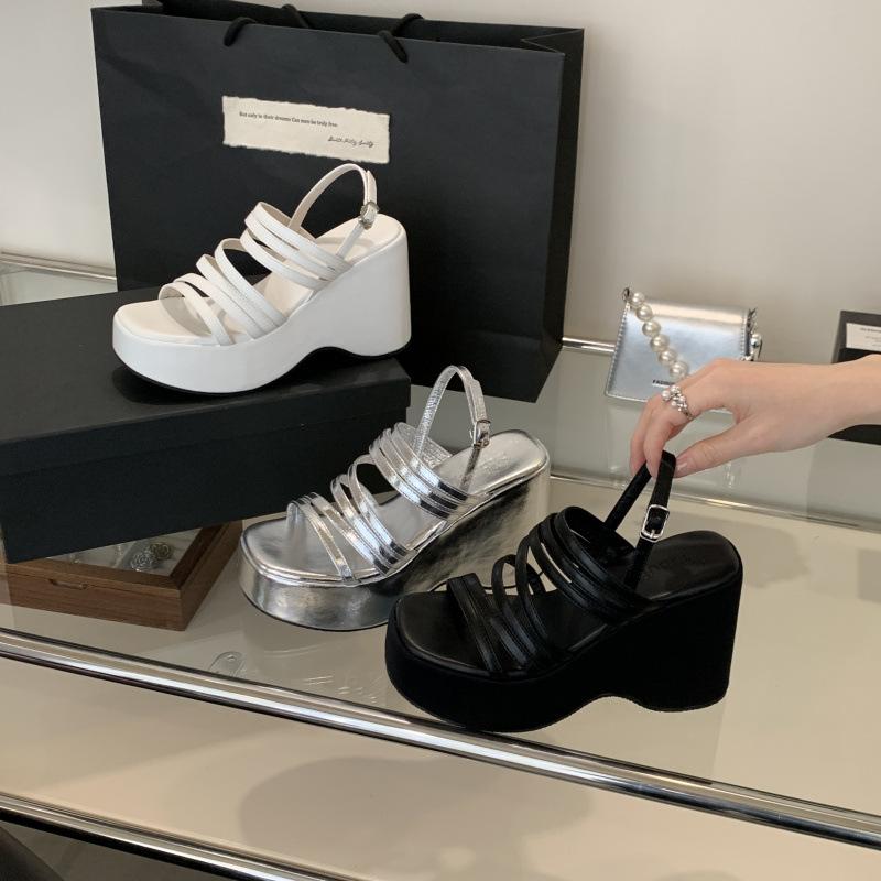 Height increase 10cm waterproof table 2025 summer new thick-soled heel high muffin thin strap black versatile silver wedge heel sandals