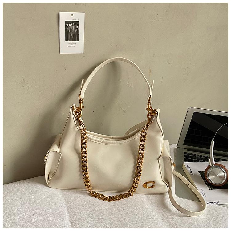 

Модная цепочная сумка на плечо женская 2025 новая высококлассная нишевая ретро сумка под мышкой зарубежный газ восковая кожа с масляной пропиткой сумка для поездок на работу