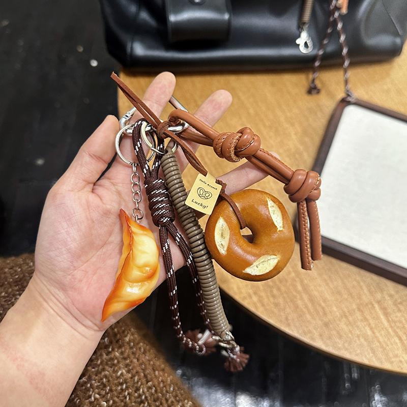 Yogodlns Cute Smiling Face Bread Woven Rope Dumpling Pendant Bag Accessory Handmade Trendy Bag Hanging Alkali Water Bread Bagel Bag Pendant