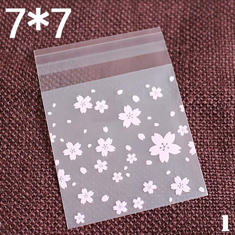 100pcs Pink Transparent Cherry Blossoms Mini Self Adhesive Scrub Opp Bags DIY