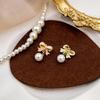 Trendy Pink Bow Pearl Clip-On Earrings - Korean Style Fashionable & Versatile New Arrival