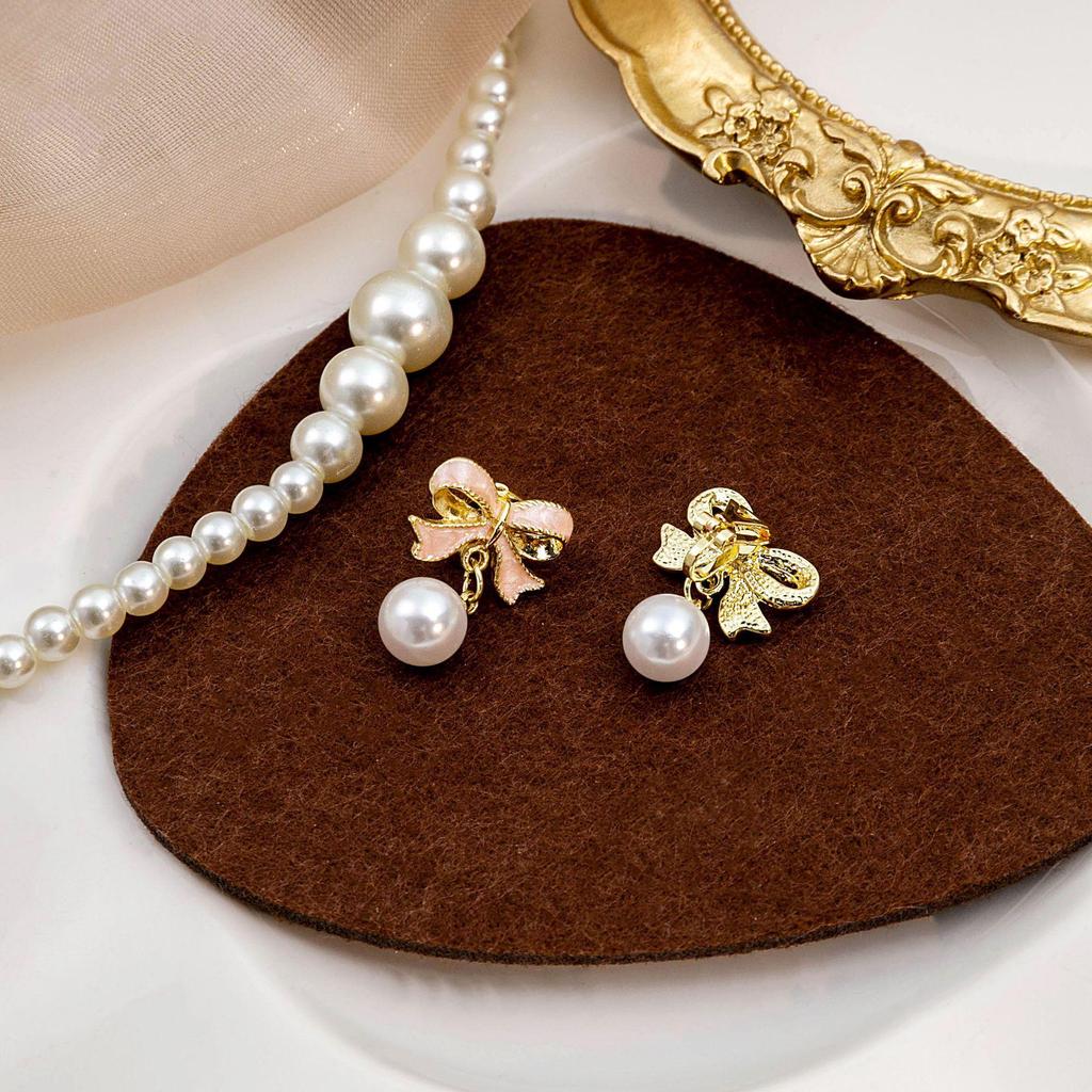 Trendy Pink Bow Pearl Clip-On Earrings - Korean Style Fashionable & Versatile New Arrival