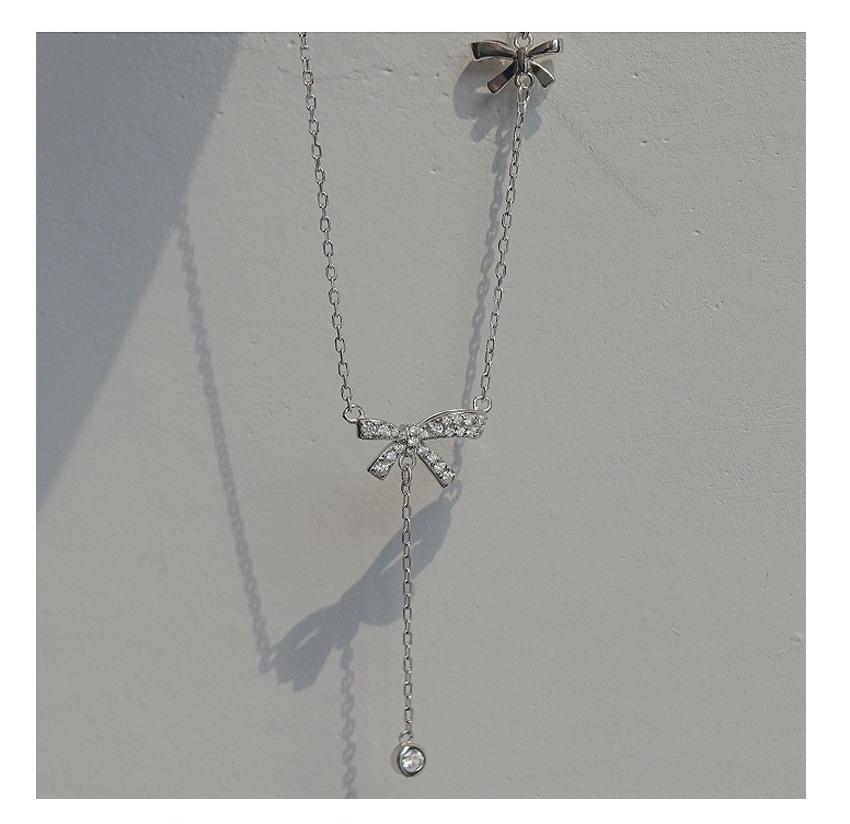 Elegant S925 Sterling Silver Bow Tassel Necklace: Luxury Clavicle Chain for Women with a Chic, Sophisticated Touch.