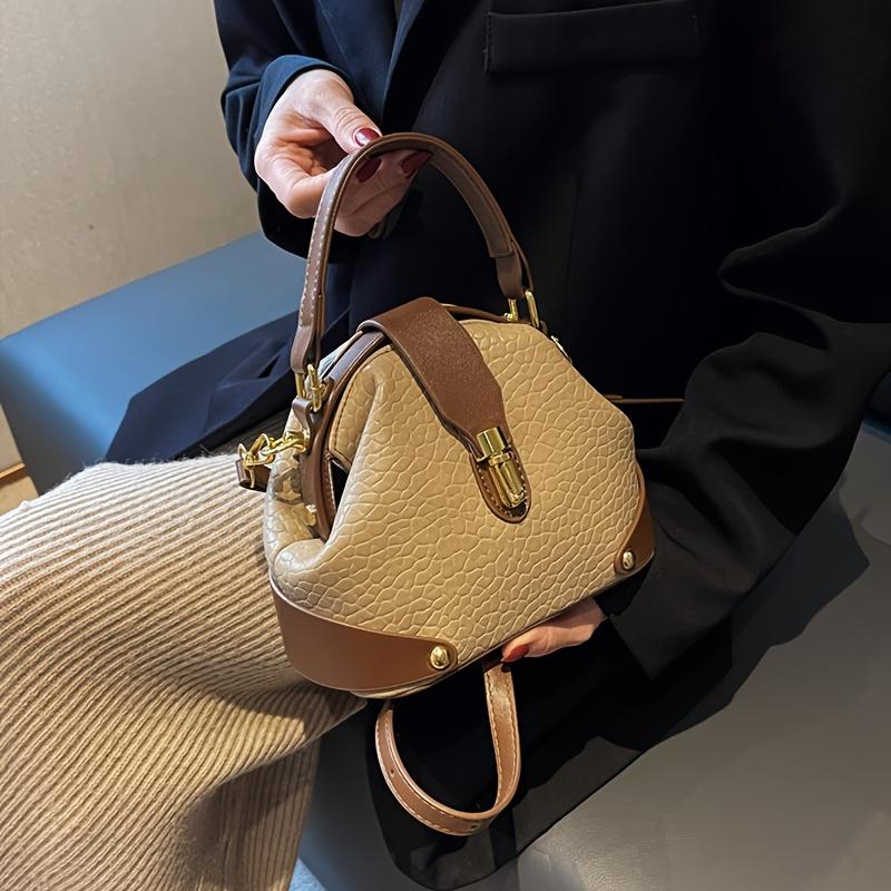 Luxury color-blocked crossbody bag, high-quality feel, stylish Western retro handbag, simple and suitable for commuting, elegant shoulder bag.