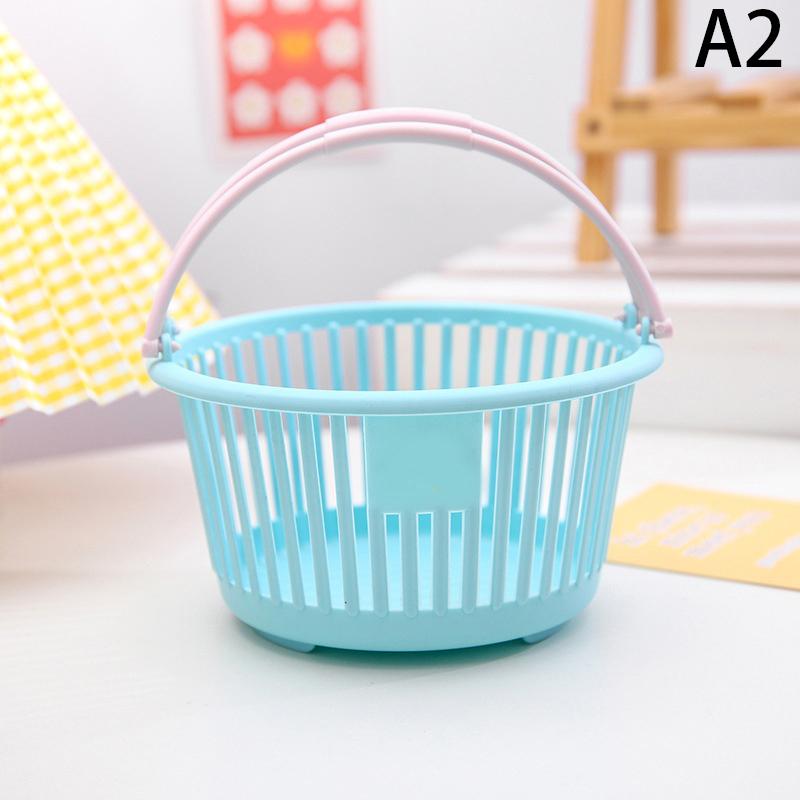 Neuer Kunststoffkorb-Organizer Tragbare Einkaufs-Aufbewahrungsbox Desktop-Kleinteile Spielzeug Obst Schreibwaren-Organizer Heimaufbewahrungskörbe