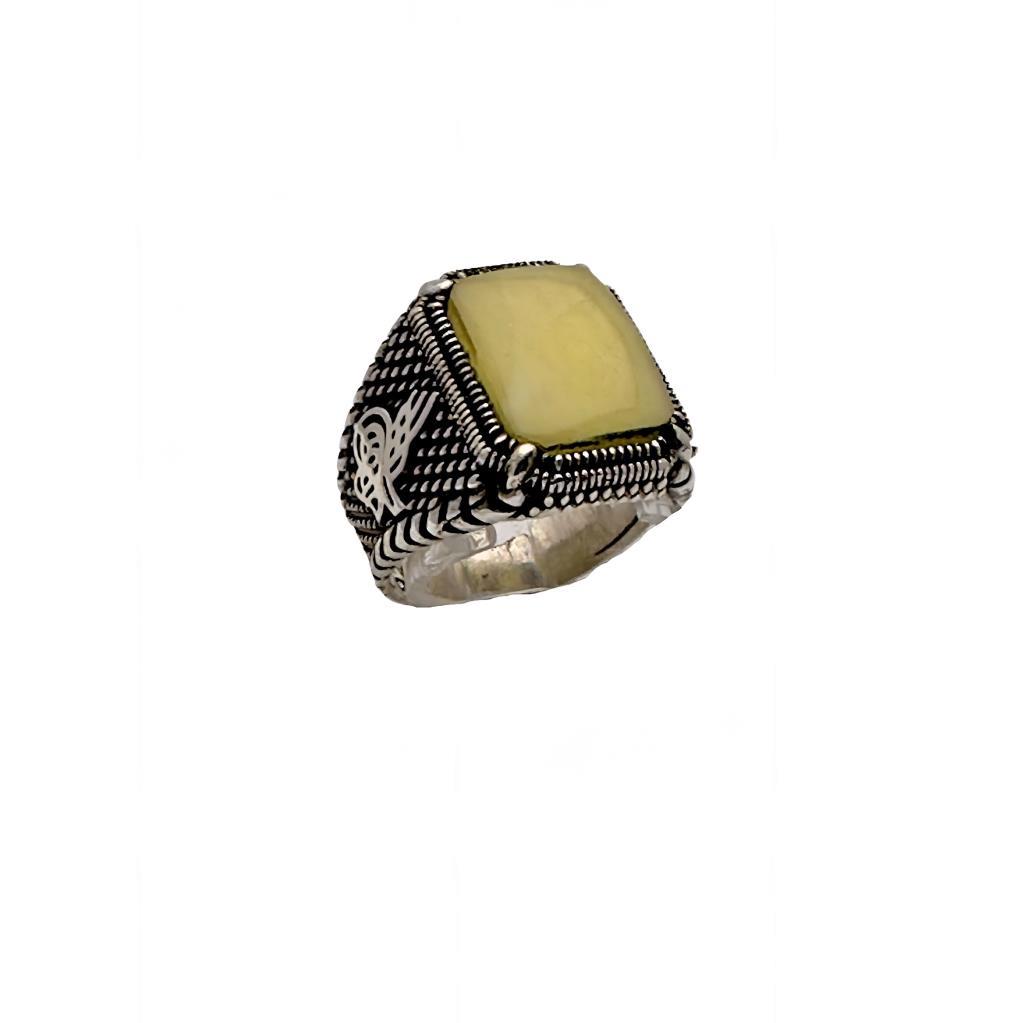 

Серебряное кольцо с фигурным янтарем Тугра 220045183G13Y
