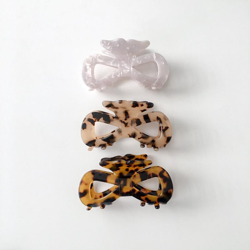 Fashionable Large Hollow Bow Hair Claw Clip For Women In Trendy Black And White Patterns