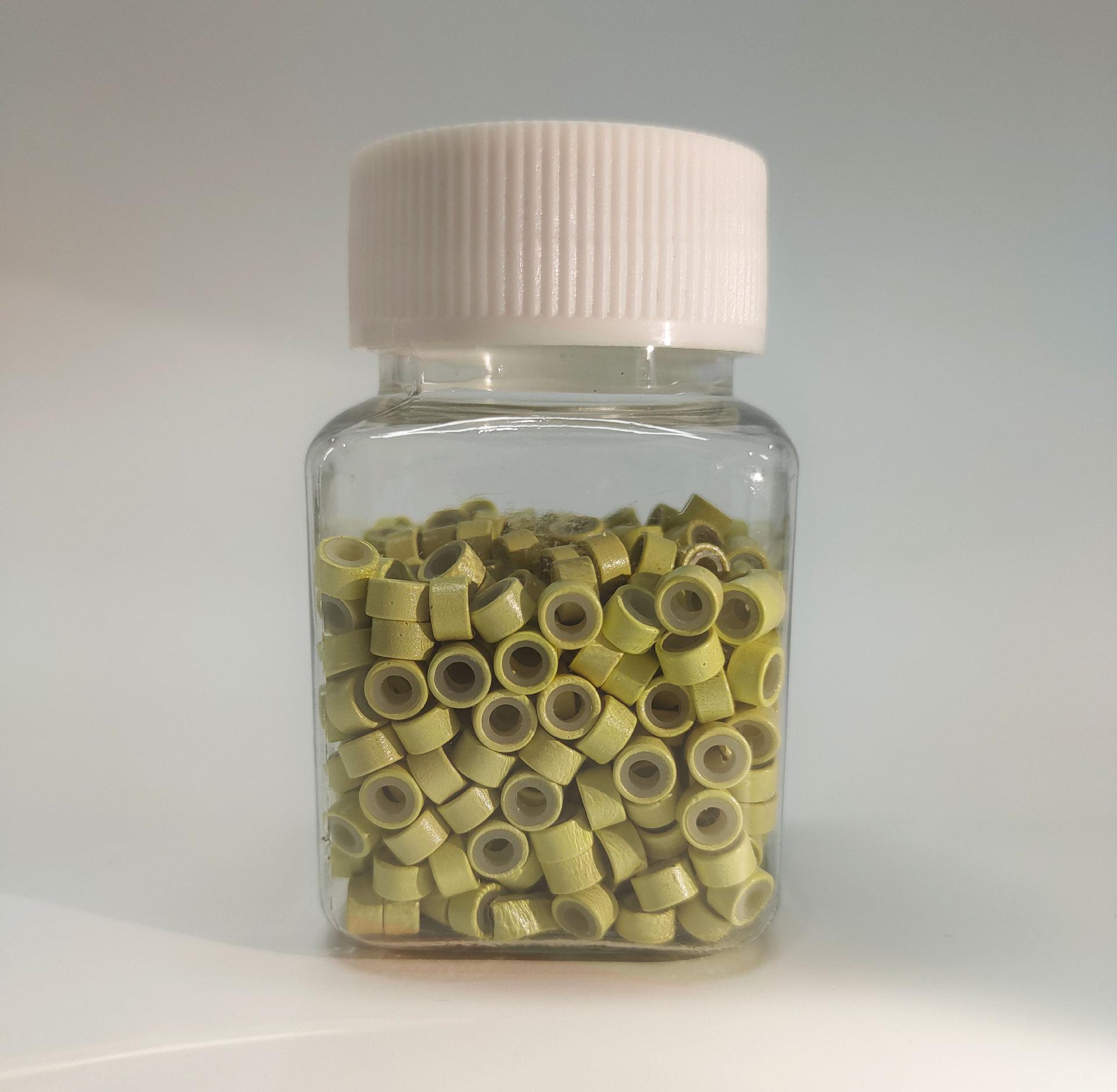 

Бесшовное кольцо для наращивания волос с силиконовой ручкой и золотой проволокой 500 pieces bottled