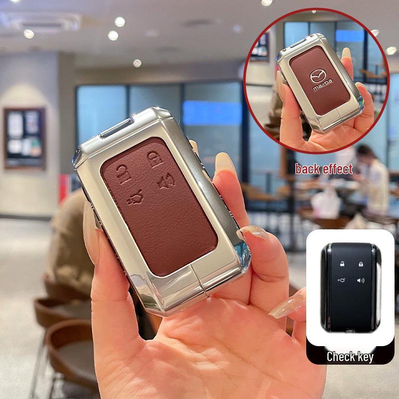 Kuooo: Wear-resistant, fully enclosed Mazda EZ6 key fob and EZ60 car remote protective cases with buckle.