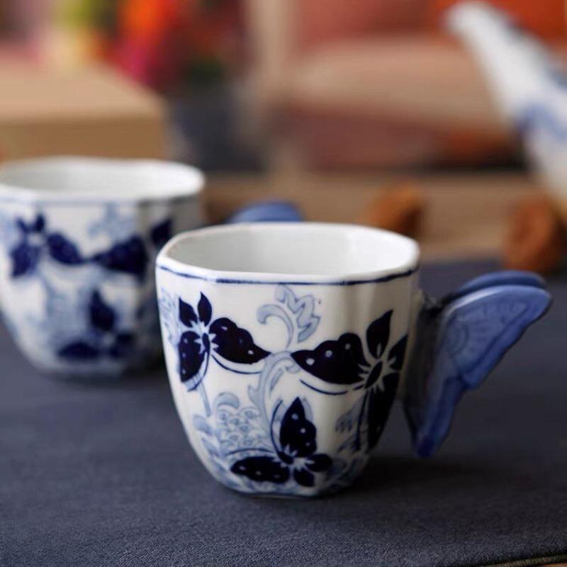 

1 Pot, 4 Cups Blue and White Porcelain Relief Butterfly Tea Set Chinese Style Large Capacity Teapot Household Tea Tasting Cup