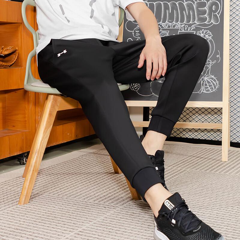 Under Armour Gładkie luźne oddychające spodnie sportowe ze ściągaczami Unisex spodnie czarne 23600707-001