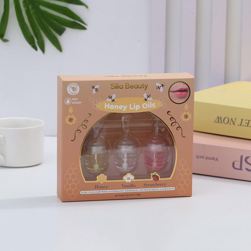 

Cross-border Honey Pot Lip Treatment: Reduces Lip Lines, Exfoliates, Moisturizes, Hydrates, with High-Value Lip Oil, Gloss, and Mask Benefits.