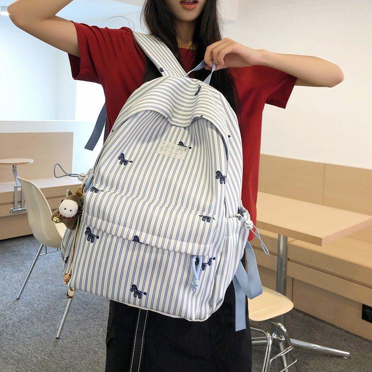 Schoolbag: New Korean-style striped backpack, fresh student backpack, versatile school bag, large-capacity commuter student backpack