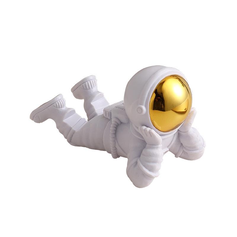 Pamiątka astronauty: Kreatywna ozdoba na biurko i uchwyt na telefon do salonu lub na prezent