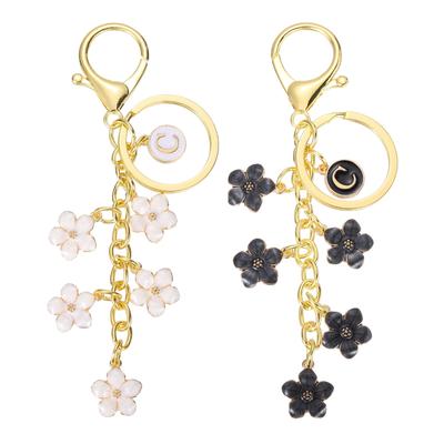 [uxcell] Lot de 2 Porte-clés Lettre Initiale Fleur C Blanc Noir pour Femmes, Sacs à Main, Sacs à Dos, Portefeuilles et Accessoires