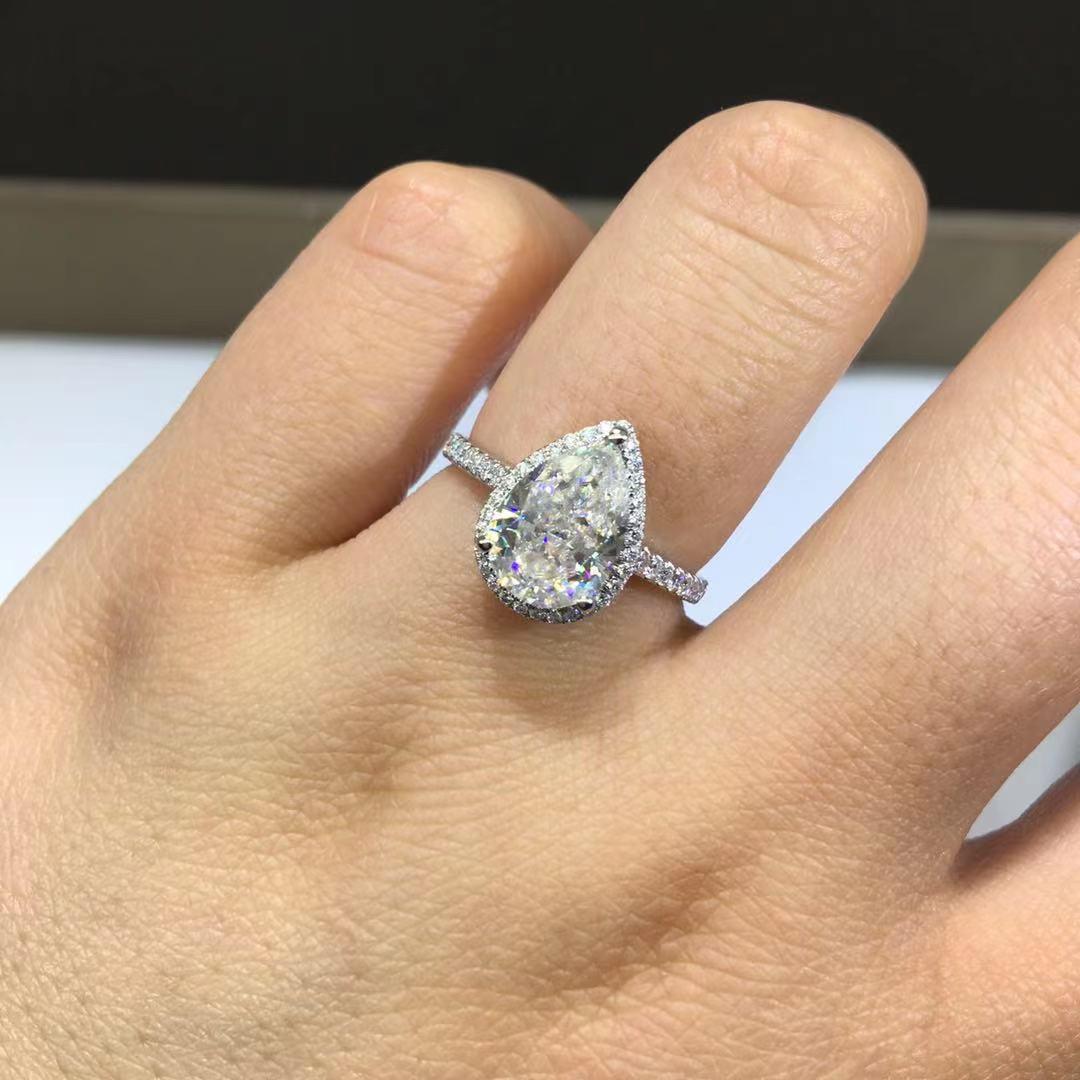 Irregular Water Drop Moissanite Ring with Pave Setting, Certified D Color Diamond. Size 19