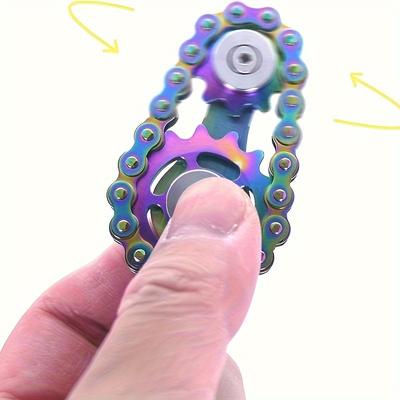 Finger Gyro, A Finger Game With Rotating Gears Designed To Relieve Stress, Made Of Durable Stainless Steel With Smooth Bearings.