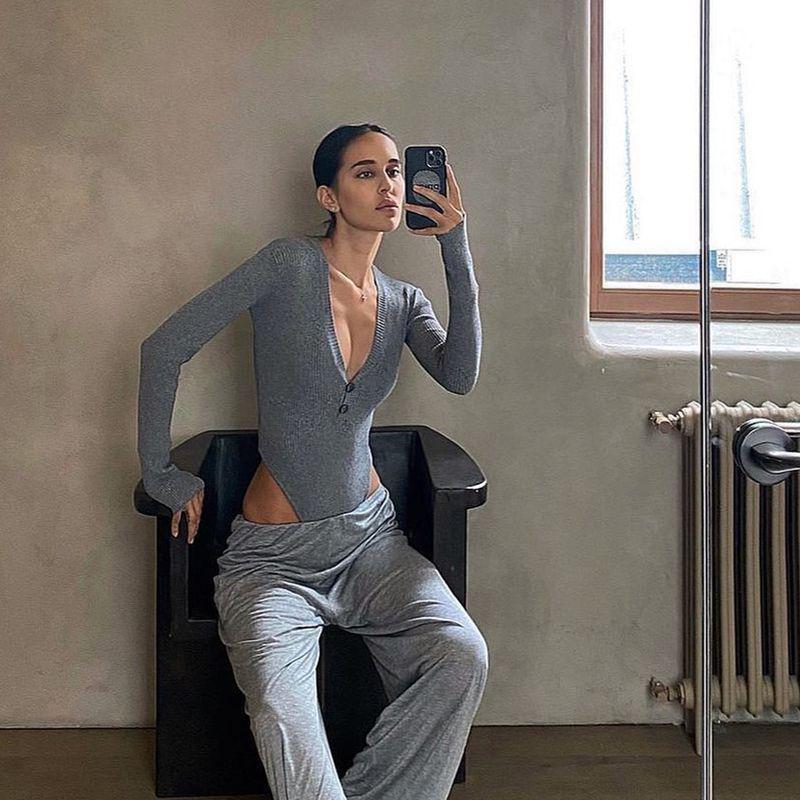 Deep V Low-Cut Long Sleeve Bodysuit Top with Button and Finger Hook for Women, Slim Fit.